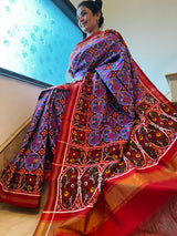 Double Ikat Patan Patola saree, featuring an exquisite rose motif