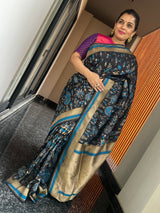 A Radiant Blend of Black, Blue, and Gold on Katan Silk