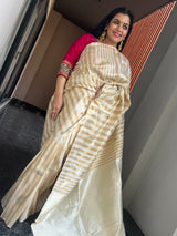 Graceful Beauty of a Cream Ektara Katan Silk Striped Saree with Peacocks