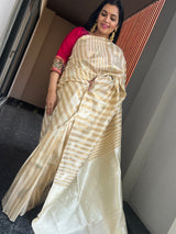 Graceful Beauty of a Cream Ektara Katan Silk Striped Saree with Peacocks