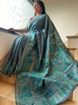 Teal Majesty: Artistry in Silk - Unveiling the Canvas of Tradition