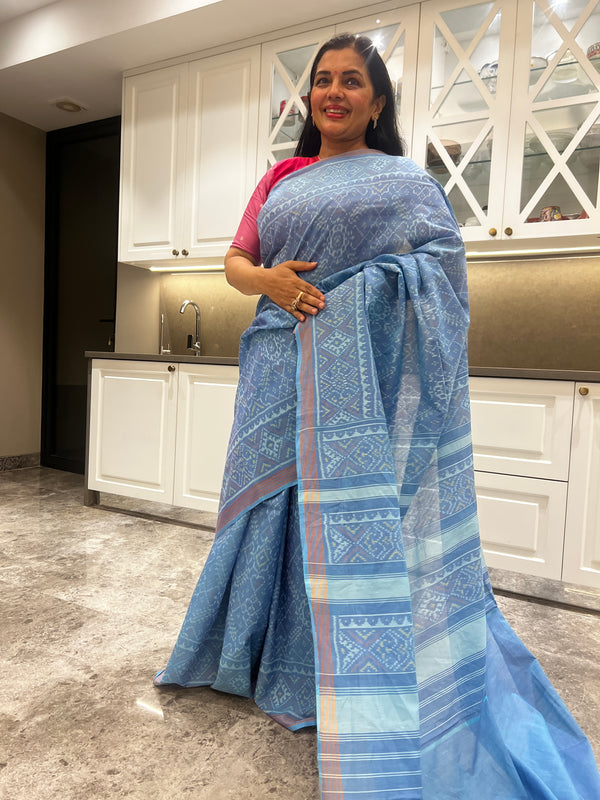 The charm of a powder blue cotton patola saree