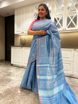 The charm of a powder blue cotton patola saree