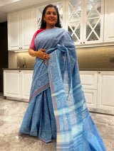 The charm of a powder blue cotton patola saree