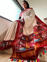 White double ikat patan patola saree complete with multicolour tassels on pallu