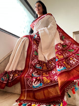 White double ikat patan patola saree complete with multicolour tassels on pallu