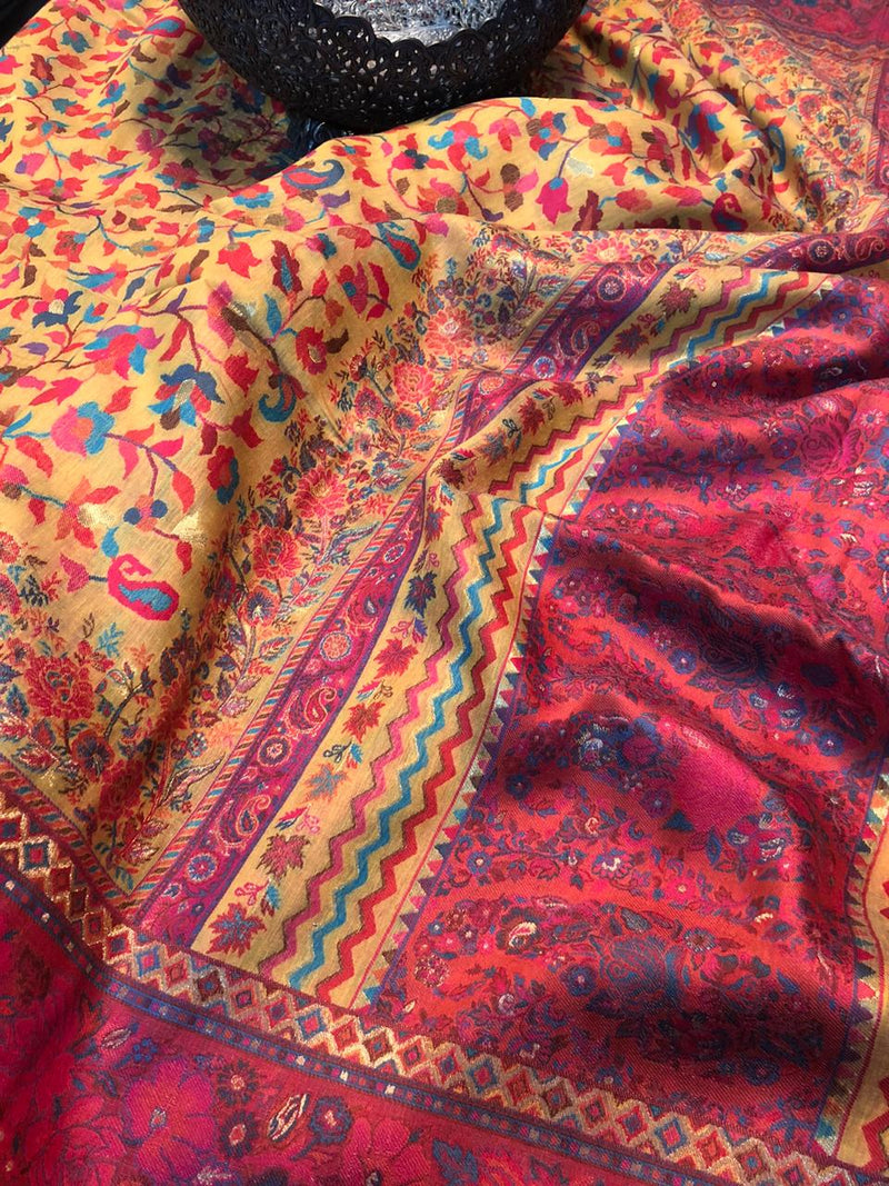 Yellow and pink Kani saree with a narrow border