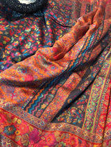 Charcoal grey kani saree with a broad border