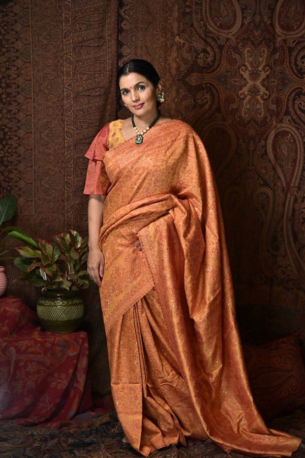 Turmeric yellow and sunrise orange silk saree