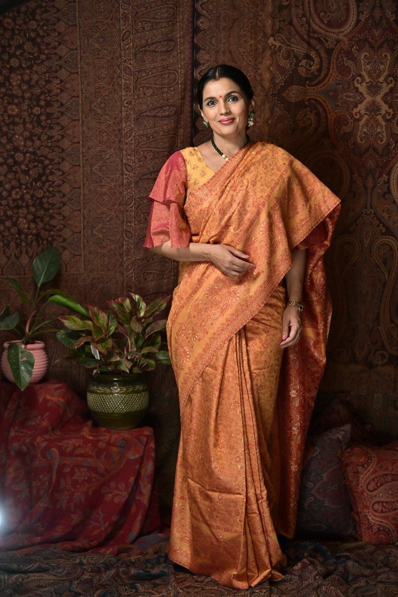 Turmeric yellow and sunrise orange silk saree